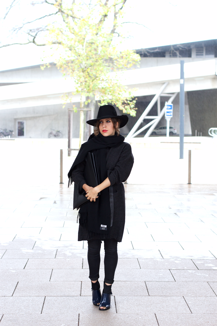 all black outfit hat and acne canada
